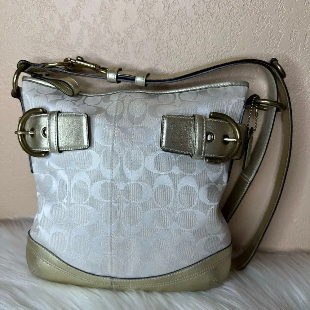 Coach tiny gold